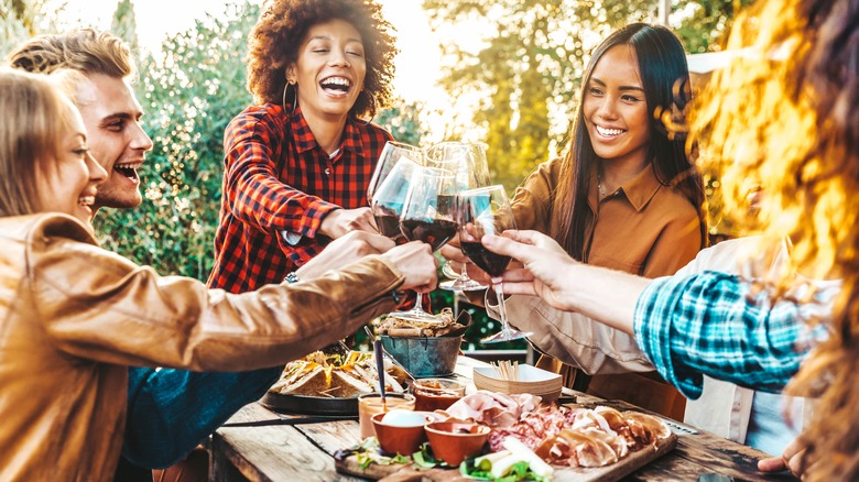 friends toasting with wine