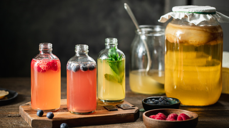 Juice in containers with fruit