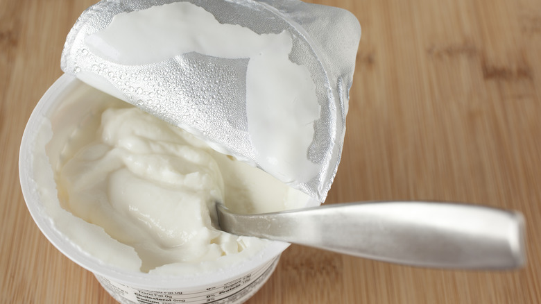 Container of Greek yogurt