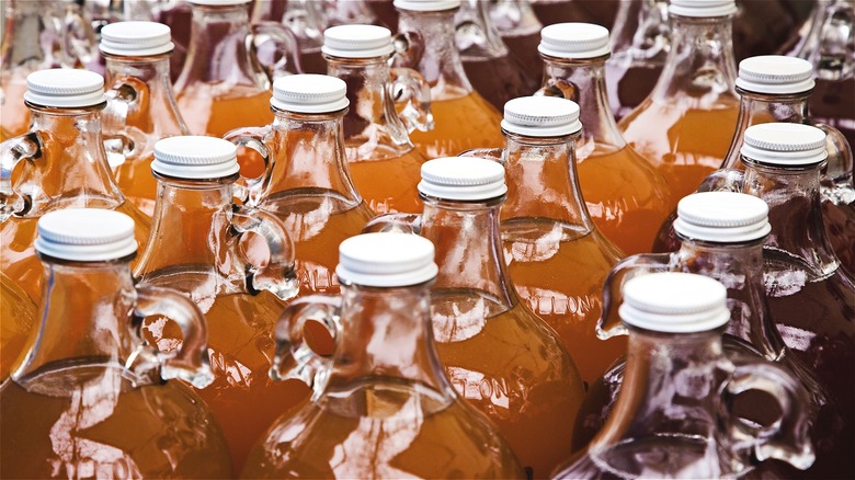 Apple juice in glass bottles 