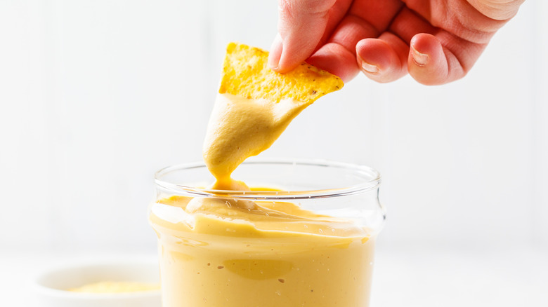 dipping chip in cashew cheese