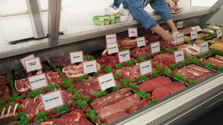 Refrigerated butcher counter with raw meats