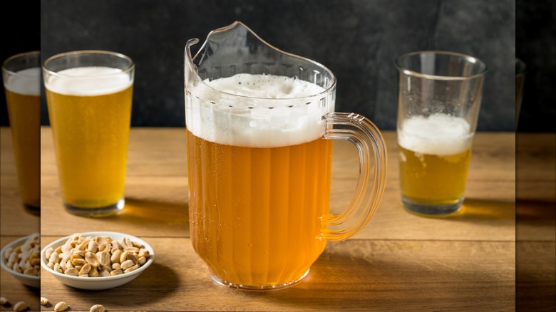 beer pitcher with two pints