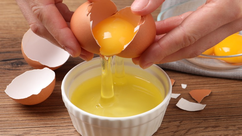 Person separating an egg