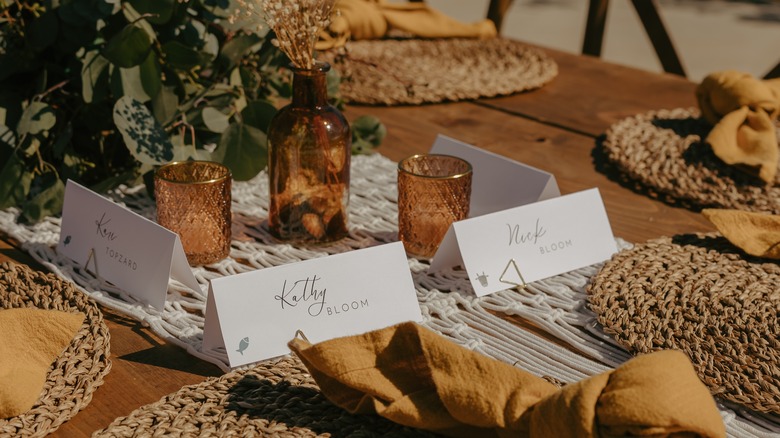 place cards at partially set table