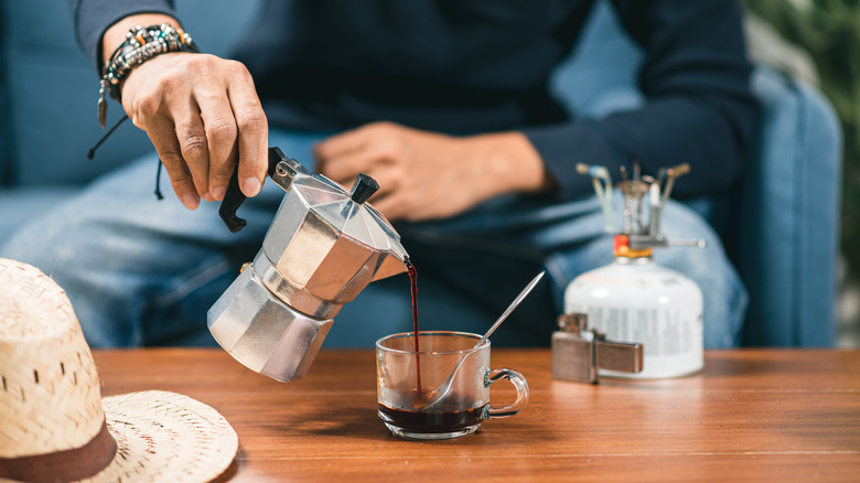 Moka pot pouring coffee