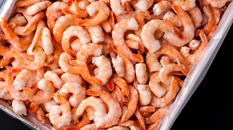 Tray of frozen cooked shrimp