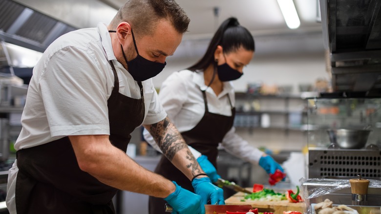 chefs working in a commercial kitchen