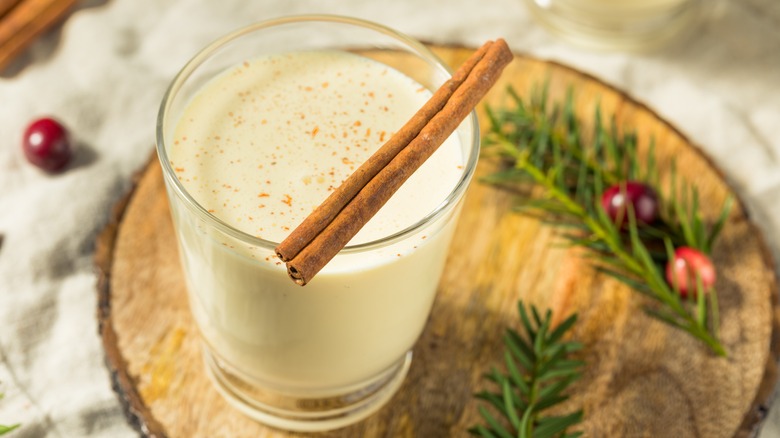 Eggnog with cinnamon stick