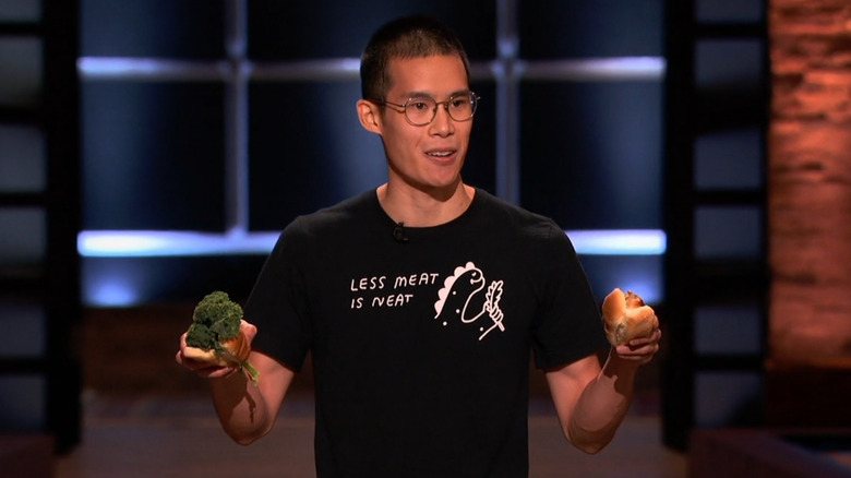 Phil Wong presenting food