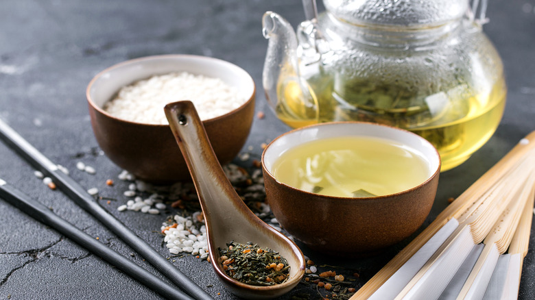 herbal tea brewed in tea pot and poured into mug