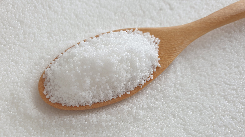 spoonful of stearic acid granules