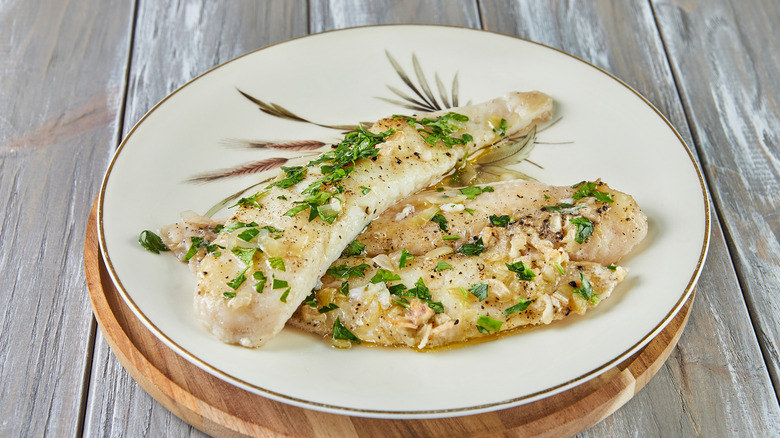 Perch fillets covered in herbs