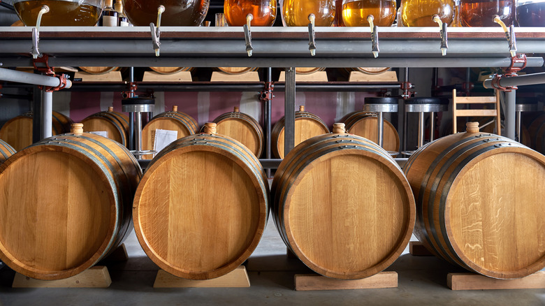whiskey aging in barrels