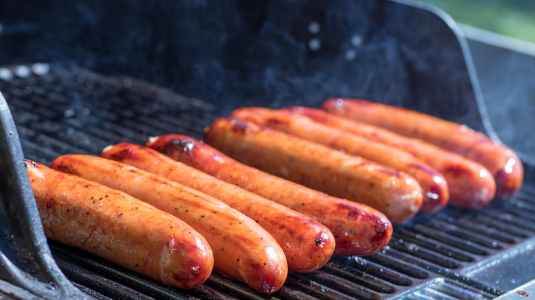 polish hot dogs on the grill 