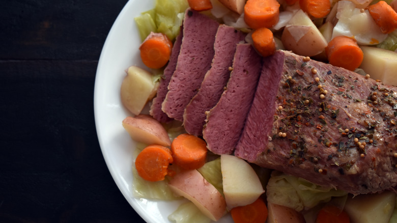 Corned beef with veggies on plate