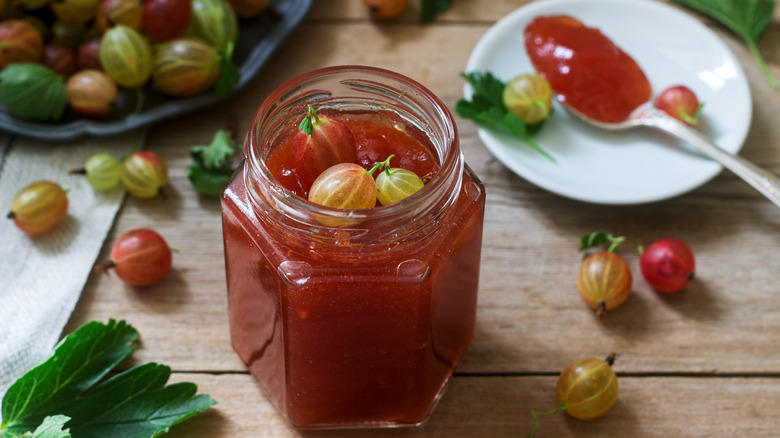 Jar of gooseberry jam with spoon