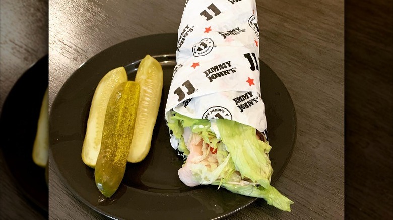 Jimmy John's sandwich with a side of pickles