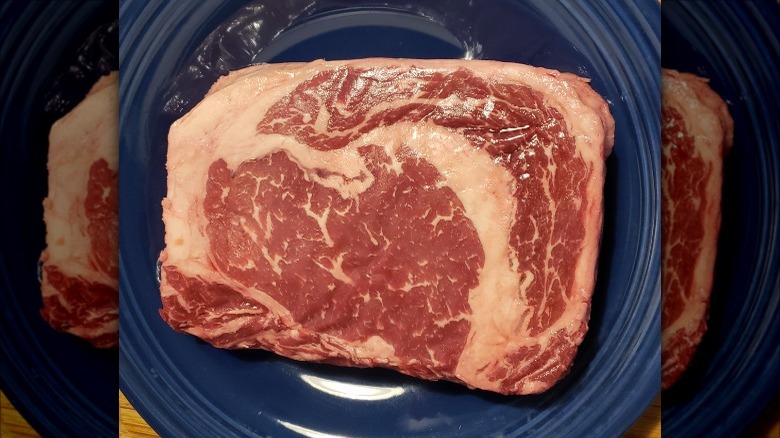 Raw cut of Black Angus Ribeye Steak