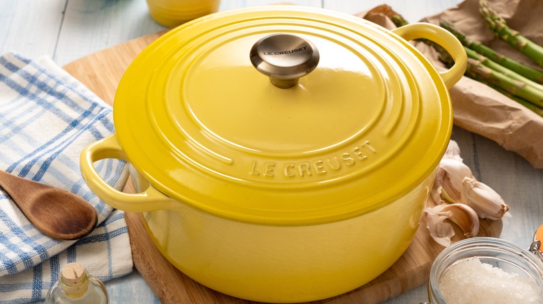 yellow le creuset Dutch oven