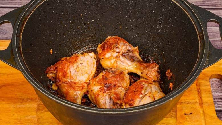 fried chicken in cast iron Dutch oven