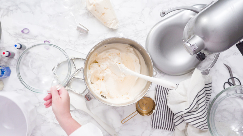 Stand mixer with bowl of icing