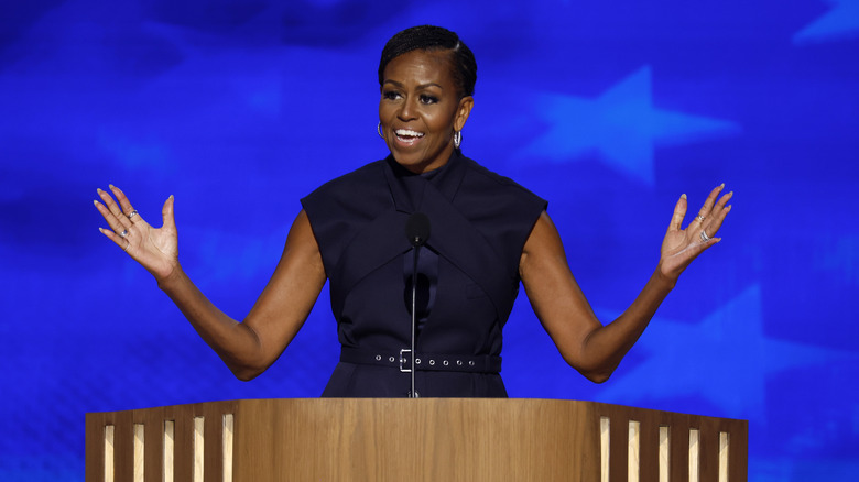 Michelle Obama speaking at a podium