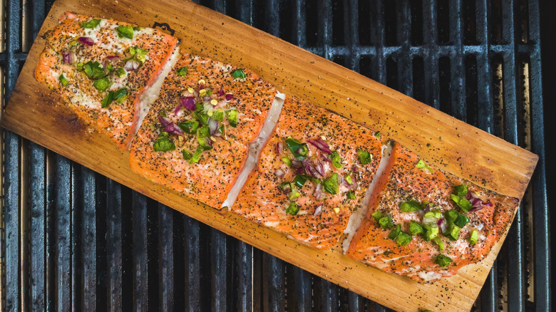 Cedar plank salmon on grill