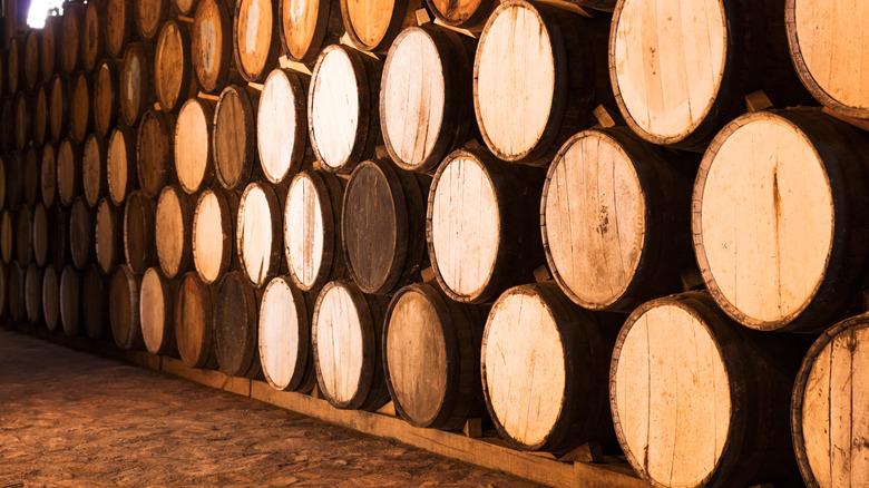 stacked tequila barrels