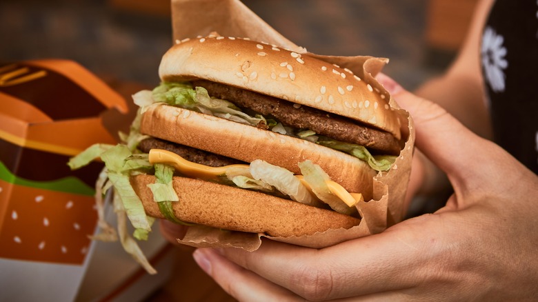 Customer holds Big Mac