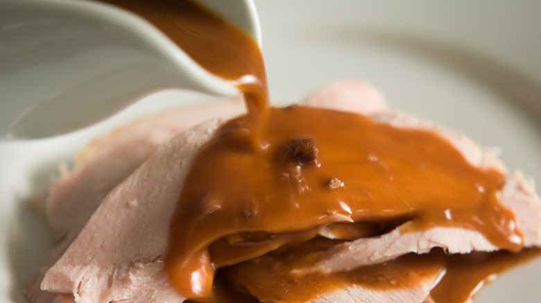 brown gravy poured over turkey