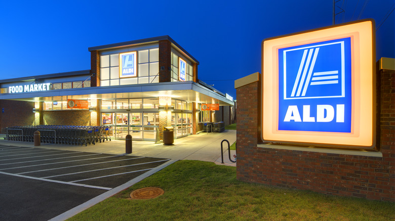 Aldi storefront lit at night