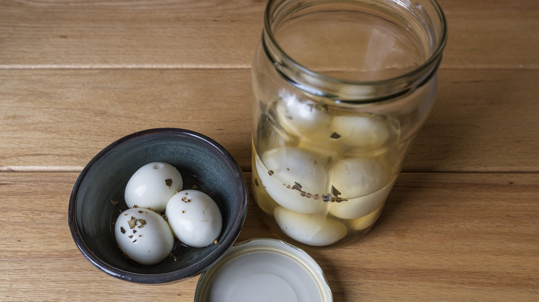 pickled eggs in a bowl and in a jar