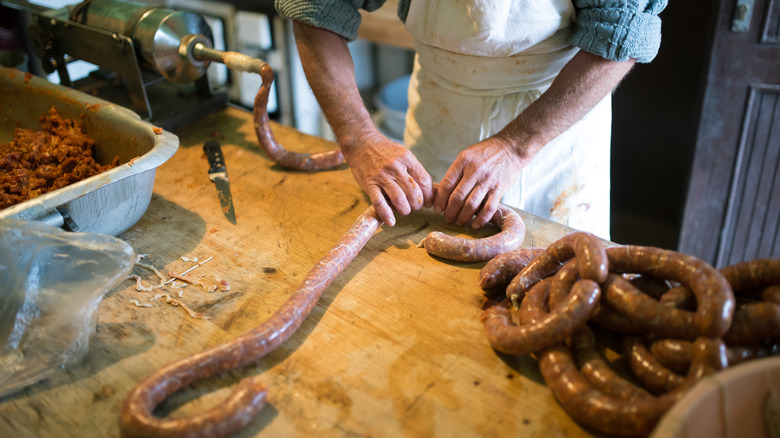 Making sausage by hand