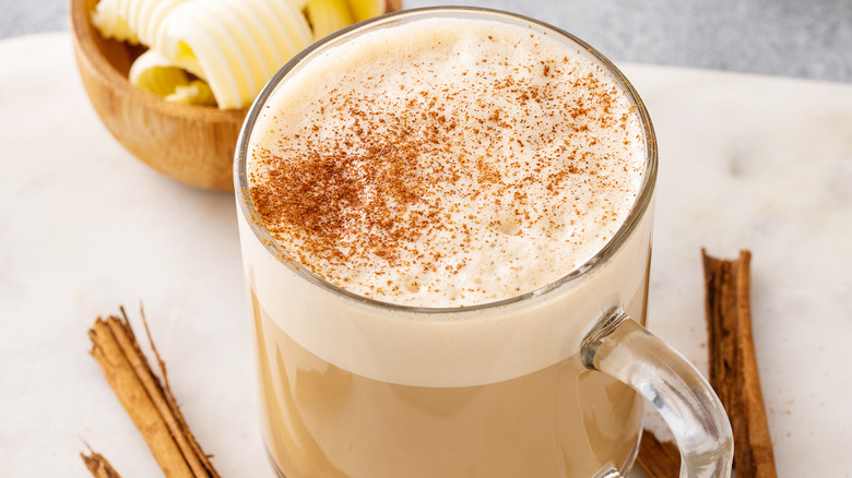 Cinnamon dusted coffee in glass mug