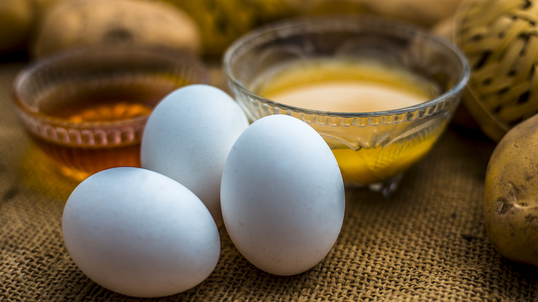 honey and eggs in bowls