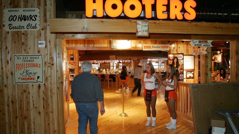 Hooters Girls welcoming restaurant guest