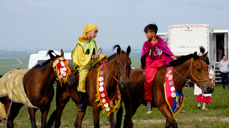 Inner Mongolian children riding horses