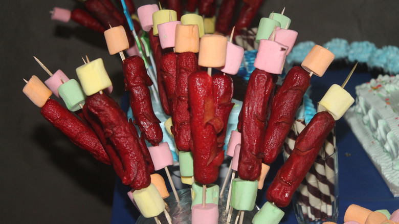 hot dogs and marshmallows on skewers