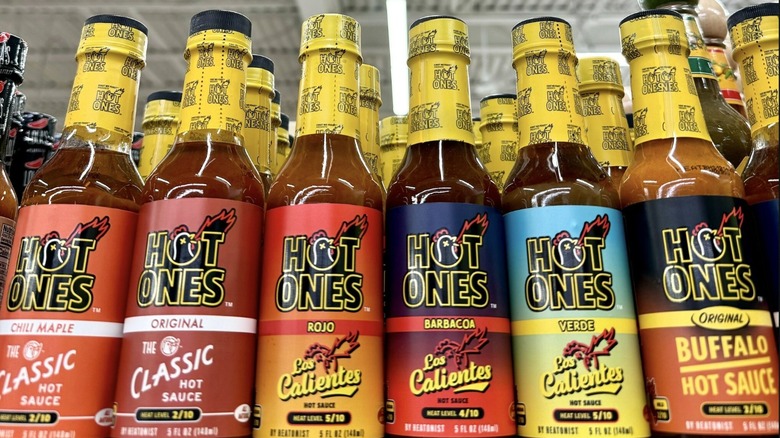 Hot Ones bottled sauces on store shelf