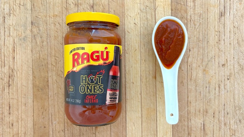 Jar and spoonful of RAGÚ x Hot Ones Limited Edition Chile Inferno sauce