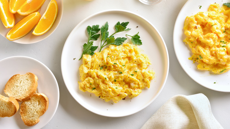 plates of scrambled eggs 