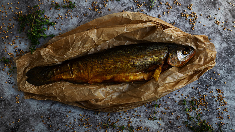 Smoked trout in parchment paper