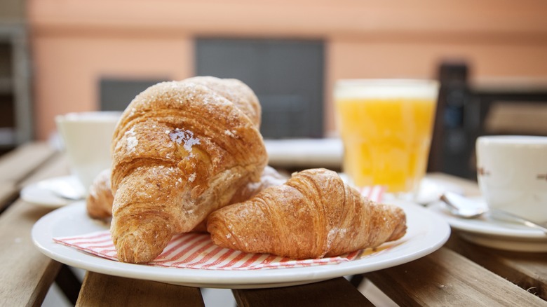 Dish with two croissants