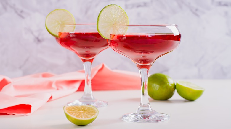 Two cosmos in coupes with lime