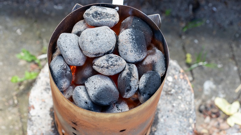 Chimney starter with charcoal