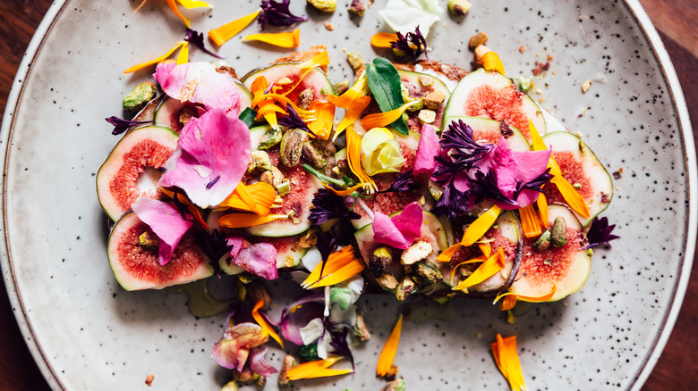 Colorful plant-based meal on a speckled plate