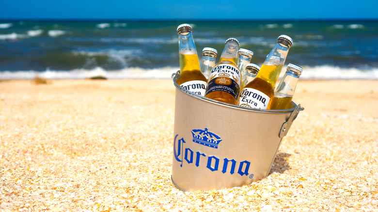 bucket of corona beer on beach