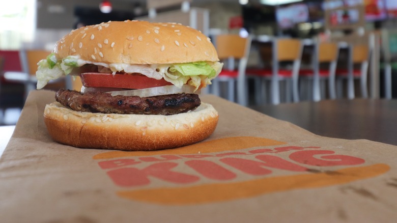 Closeup of Whopper Jr. on Burger King bag