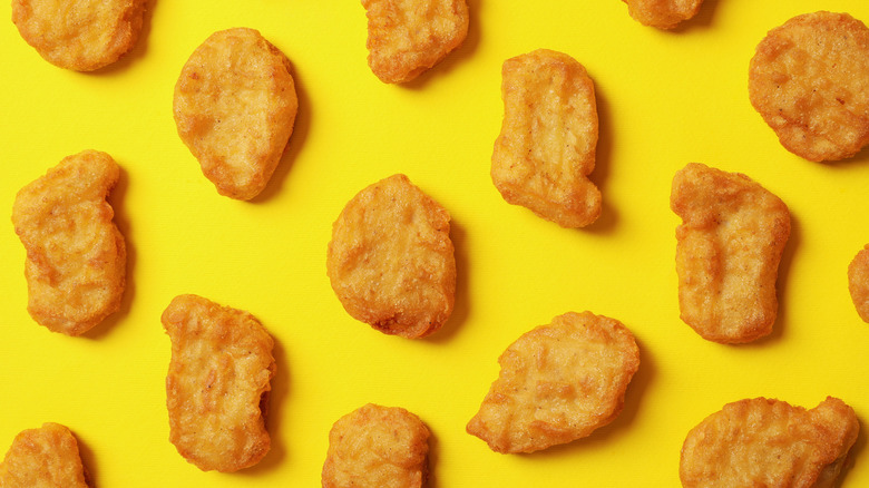 Chicken nuggets on a yellow background 